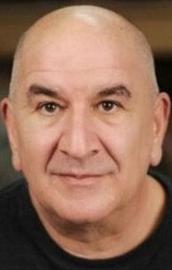 Изображение актера Майкл Словис