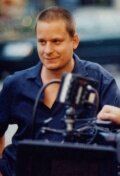 Изображение актера Аарон Вудли